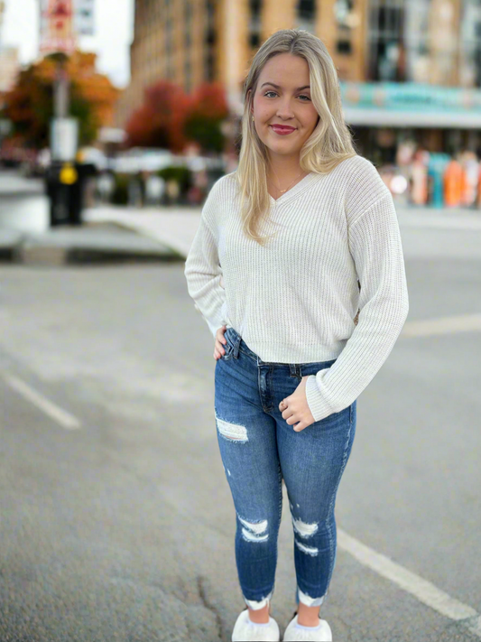 white V neck sweater